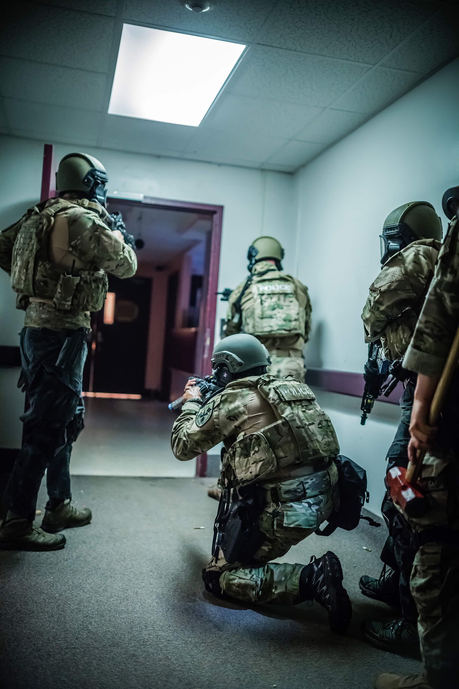 Stock photograph of a tactical response team, used illustratively